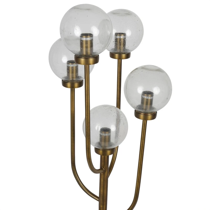 Five clear glass globes on a gold metal frame