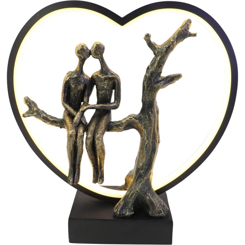 Illuminated couple ornament in a black frame