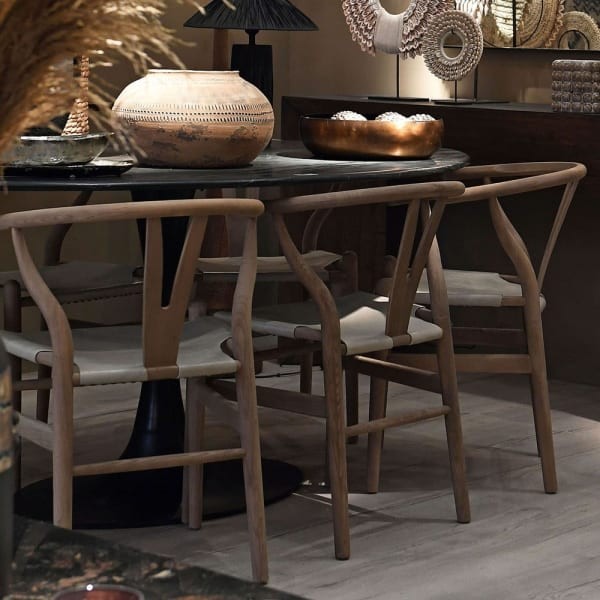 Farmhouse dining chair with open backrest and grey faux leather seat