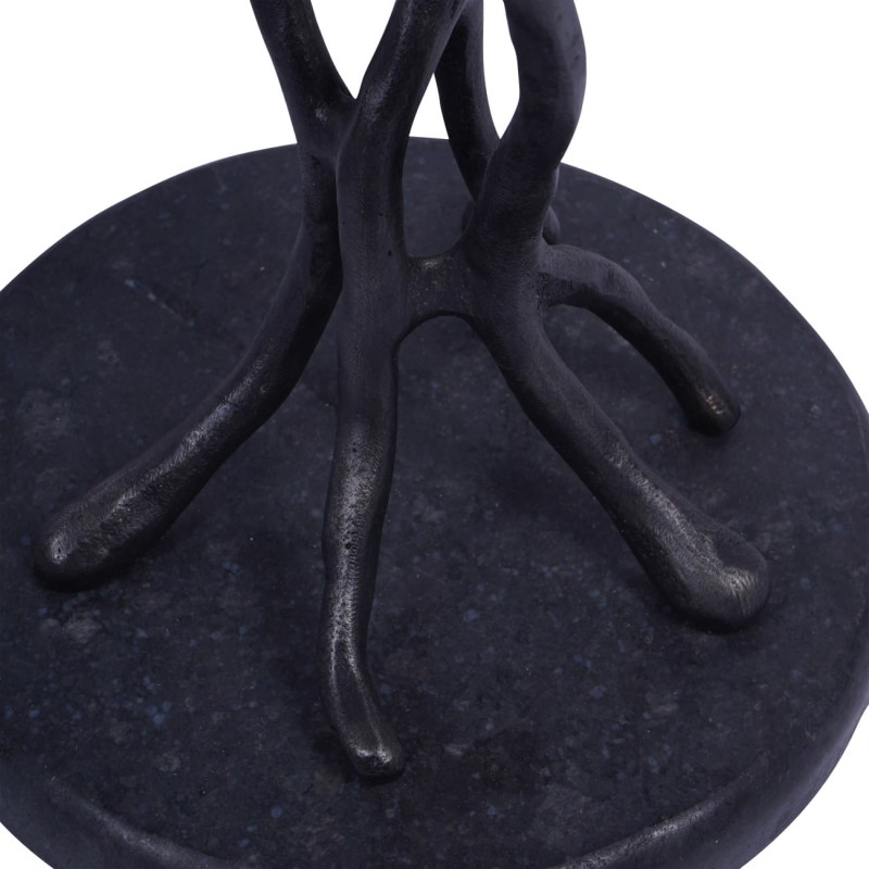 Decorative occasional table beside a sofa or armchair