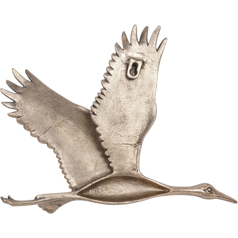 Gold bird wall decoration above a sofa or sideboard