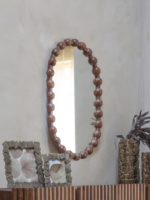 Large oval mirror measuring 89 cm high