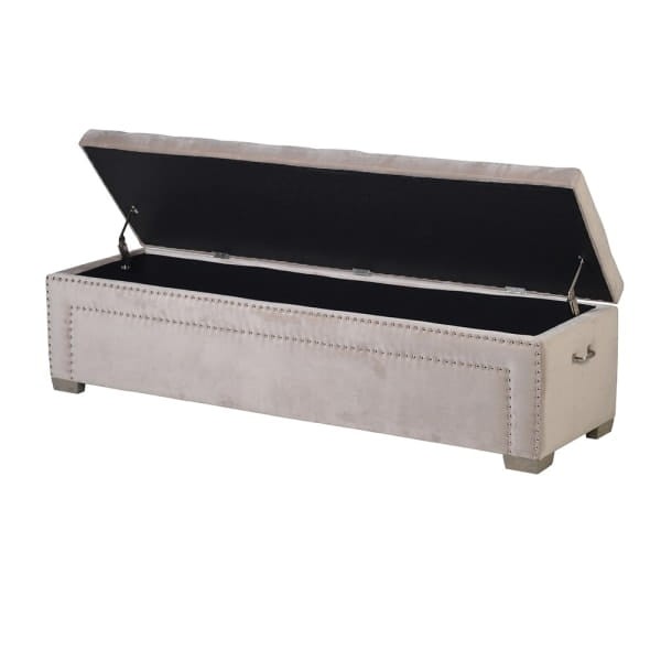 Beige upholstered bedroom storage bench with metal side handles