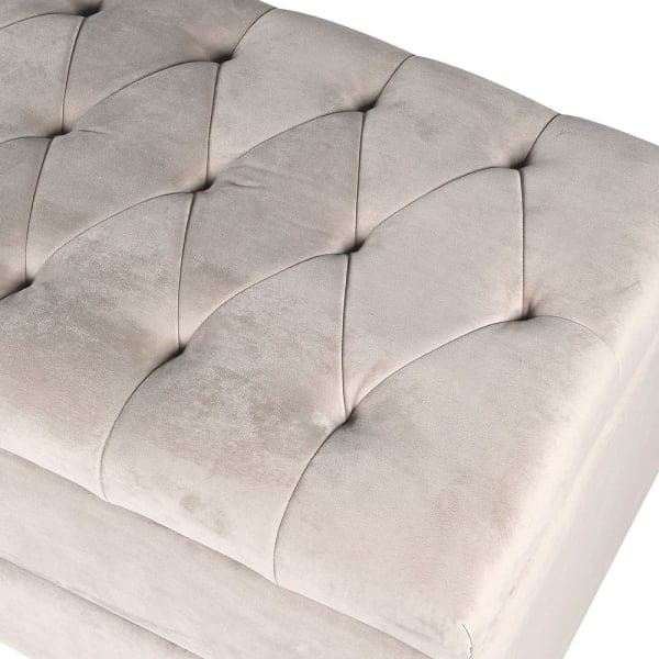 Close-up of the button-tufted cream velvet lid on the Chelsea storage bench