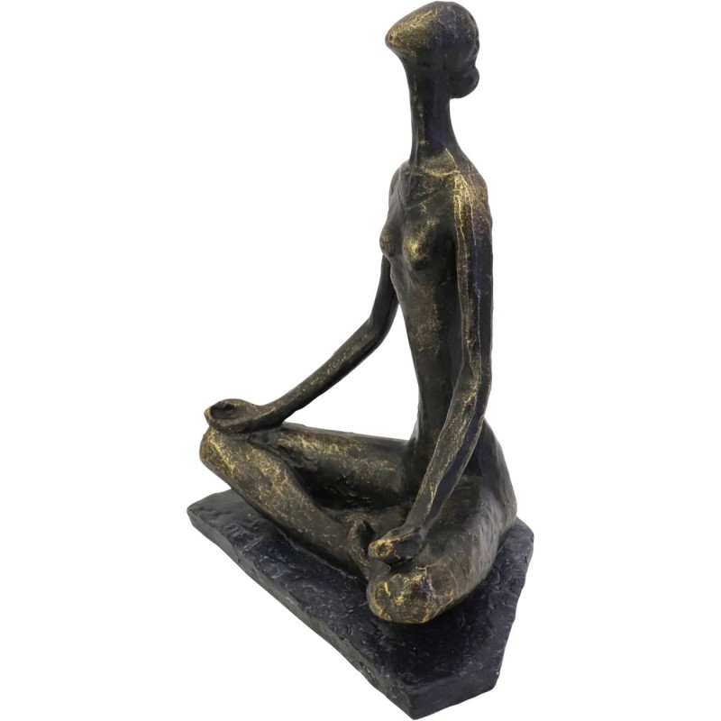 Decorative woman practising yoga sculpture