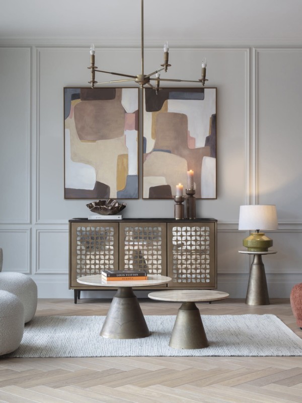 Wooden candle holder displayed on a sideboard or console table