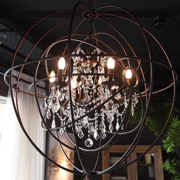 Large brown iron globe chandelier measuring 90 cm high