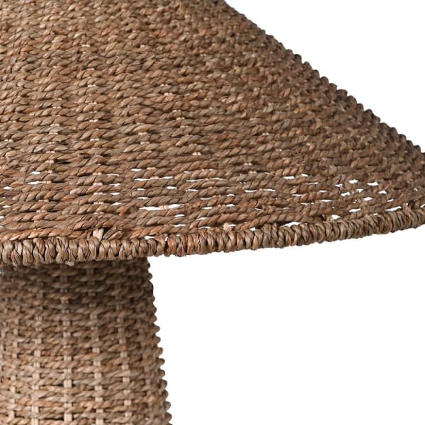 Woven rattan lamp for bedroom or conservatory interiors