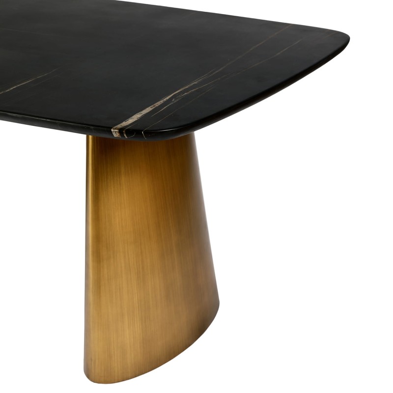 Dining table with a softly rounded rectangular marble top
