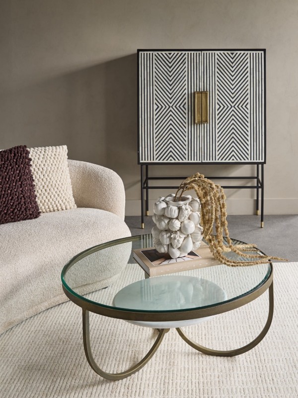 Two-door drinks cabinet on a black iron base