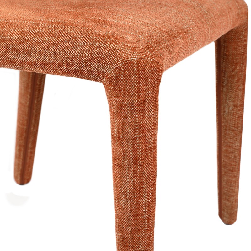 Brown dining chair with a broad rounded backrest