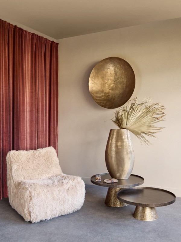Set of two round coffee tables at different heights