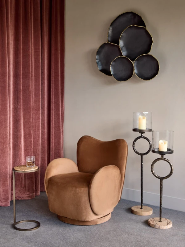 Cast aluminium wall art with irregular circular forms