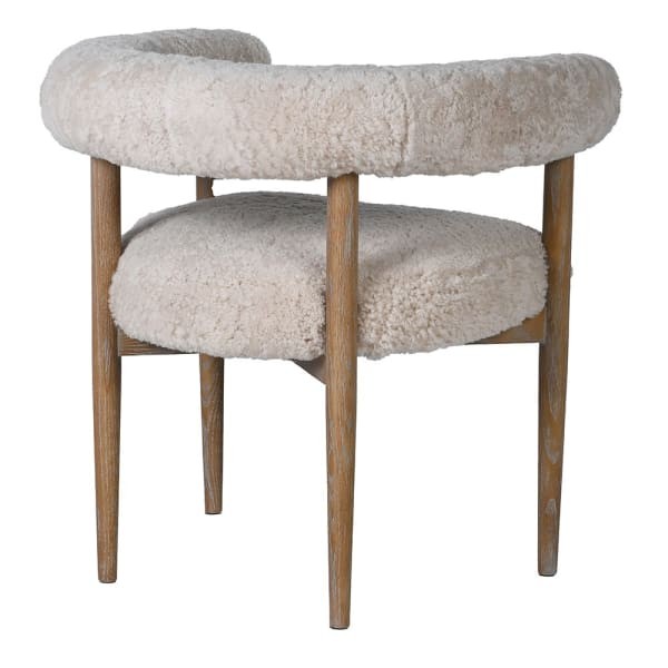 Elegant faux fur dining armchair in cream with solid ash wood construction