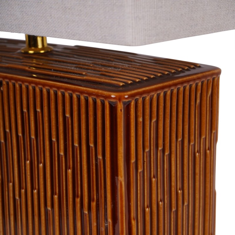 Ceramic lamp with a light beige fabric shade
