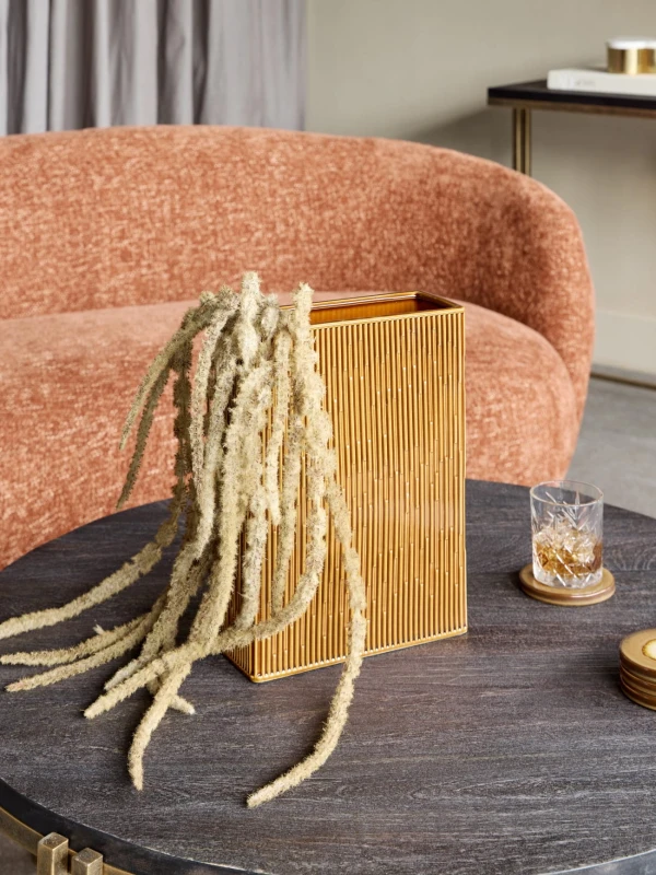 Terracotta vase with a vertically fluted surface