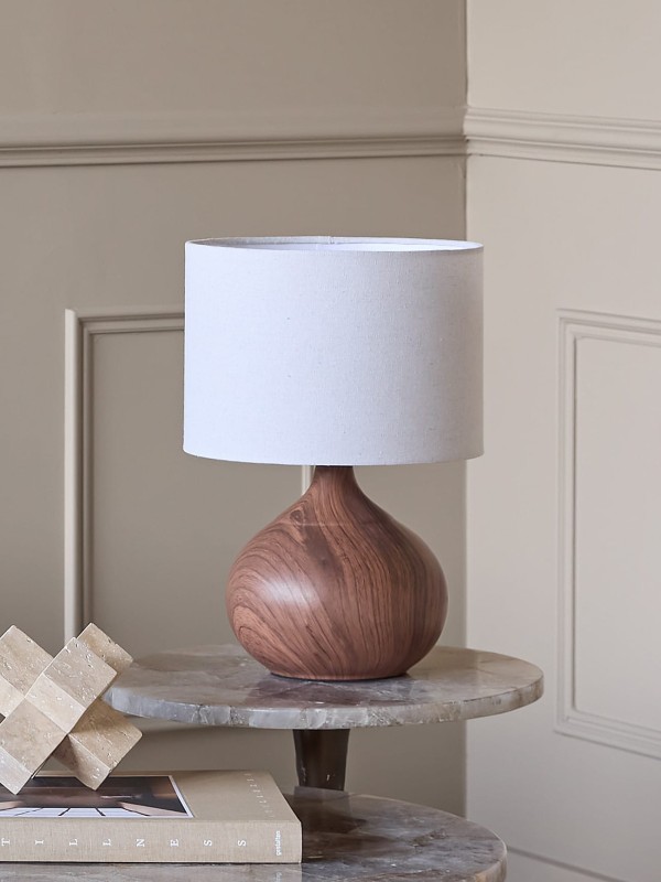 Brown ceramic table lamp with a cream shade
