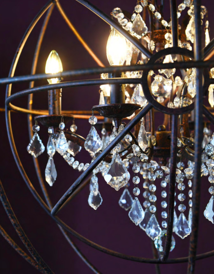 Spherical iron chandelier with decorative crystal elements