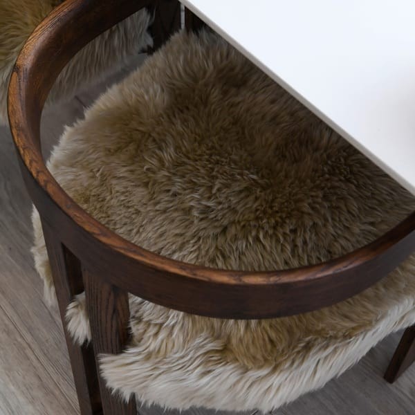 Lyall oak dining chair with enveloping backrest and arms