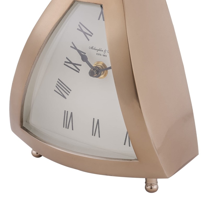 Small clock with a pale Roman numeral dial