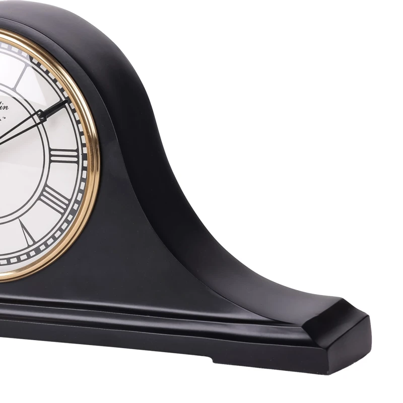 Classic black and gold clock for a living room