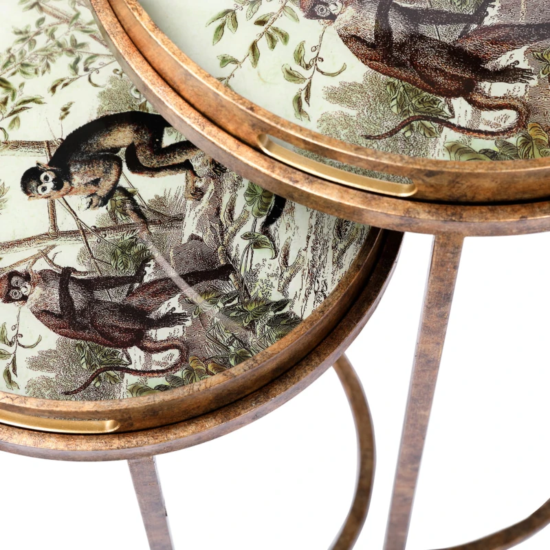 Antique gold metal side tables with glass tops