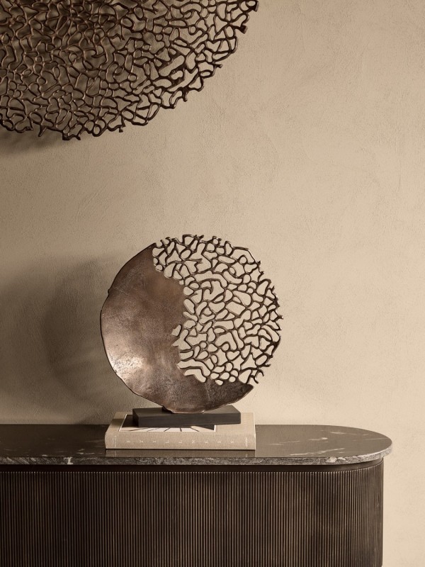 Bronze openwork sculpture with circular disc design