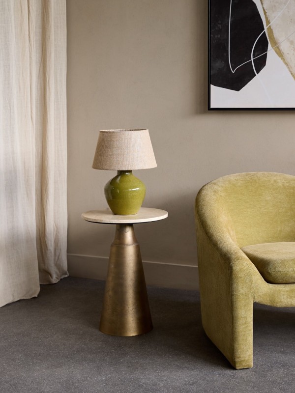 Small green table lamp with a beige hessian shade