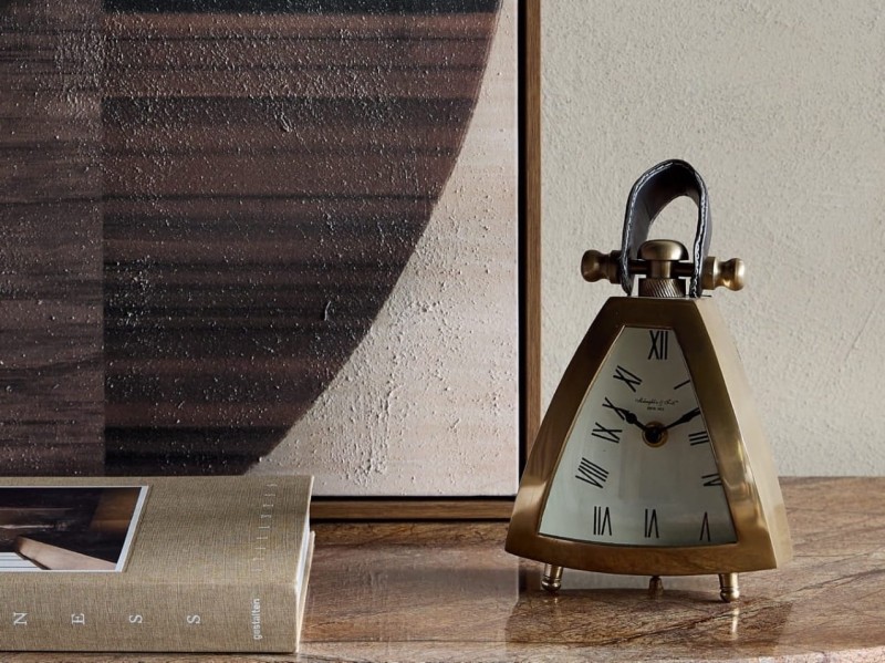 Small gold table clock with Roman numerals