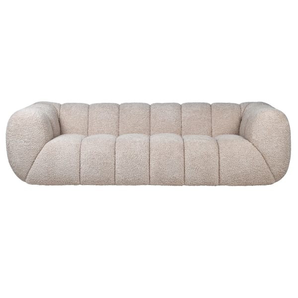 Beige Nube sofa with a rounded back and deeply tufted seat