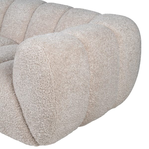 Detail of the Nube sofa upholstery – soft beige fabric and deep cushioning