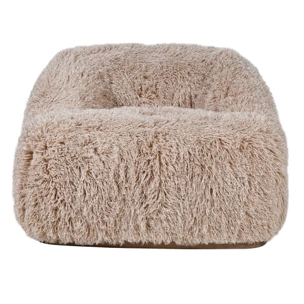 Lyall Fluffy armchair with a light upholstered seat, a distinctive curved shape and a wooden base