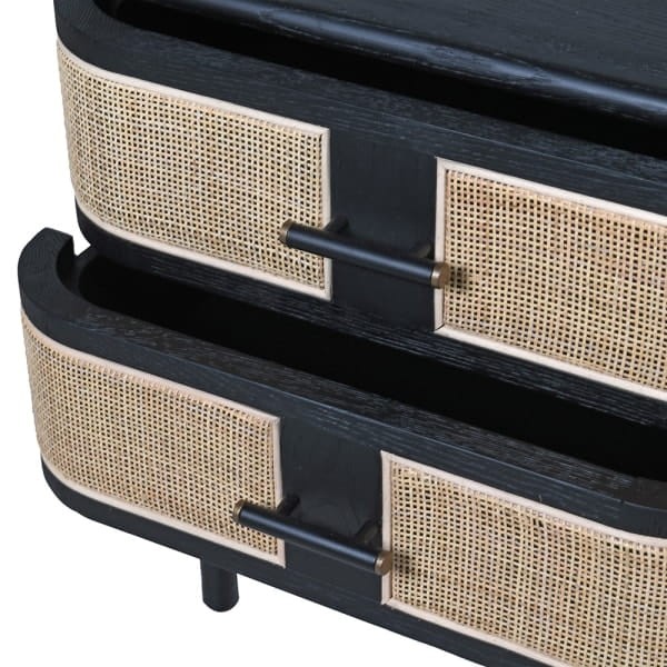 Black bedside table with natural rattan-style drawer fronts