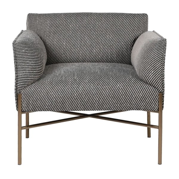 Devon modern armchair in black and white upholstery with gold metal legs