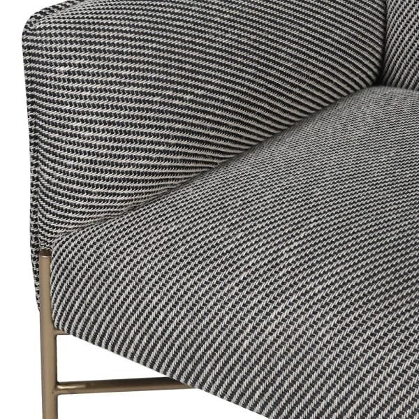 Devon modern armchair in black and white upholstery with gold metal legs