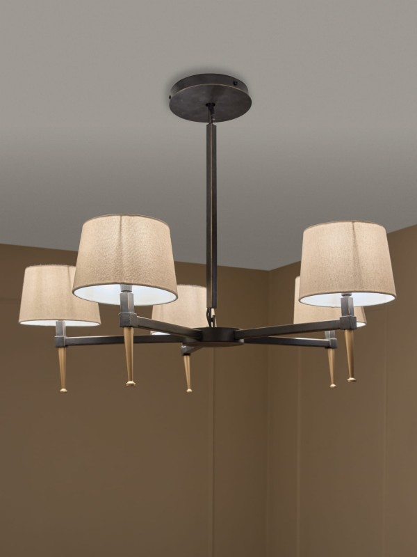 Stella 5-arm candle chandelier in black and gold with linen shades, bringing elegant ambient lighting to living rooms and dining rooms.