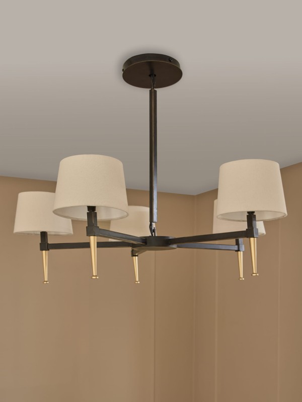 Stella 5-arm candle chandelier in black and gold with linen shades, bringing elegant ambient lighting to living rooms and dining rooms.