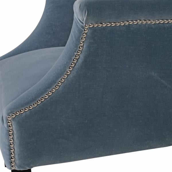 Eaton Elegance blue armchair upholstered in soft cotton velvet, offering exceptional comfort and elegant style. A luxurious living room chair with wooden legs, perfect for modern and classic interiors.