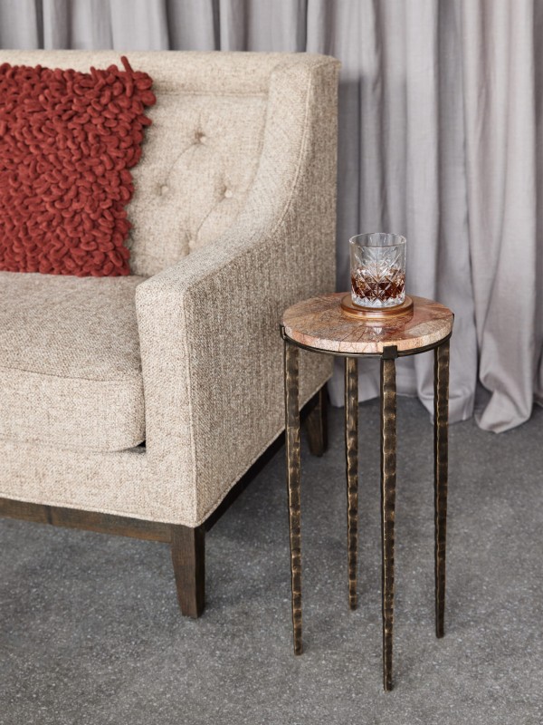 Richwood small side table with brown marble top and metal legs.