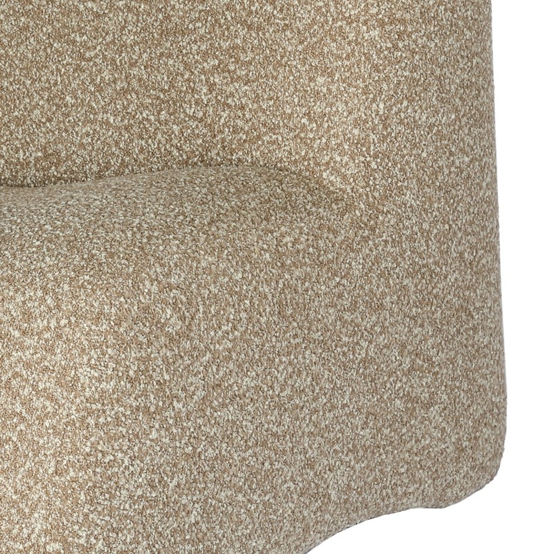 Modal bouclé armchair with footstool in beige and brown. Modern lounge chair.