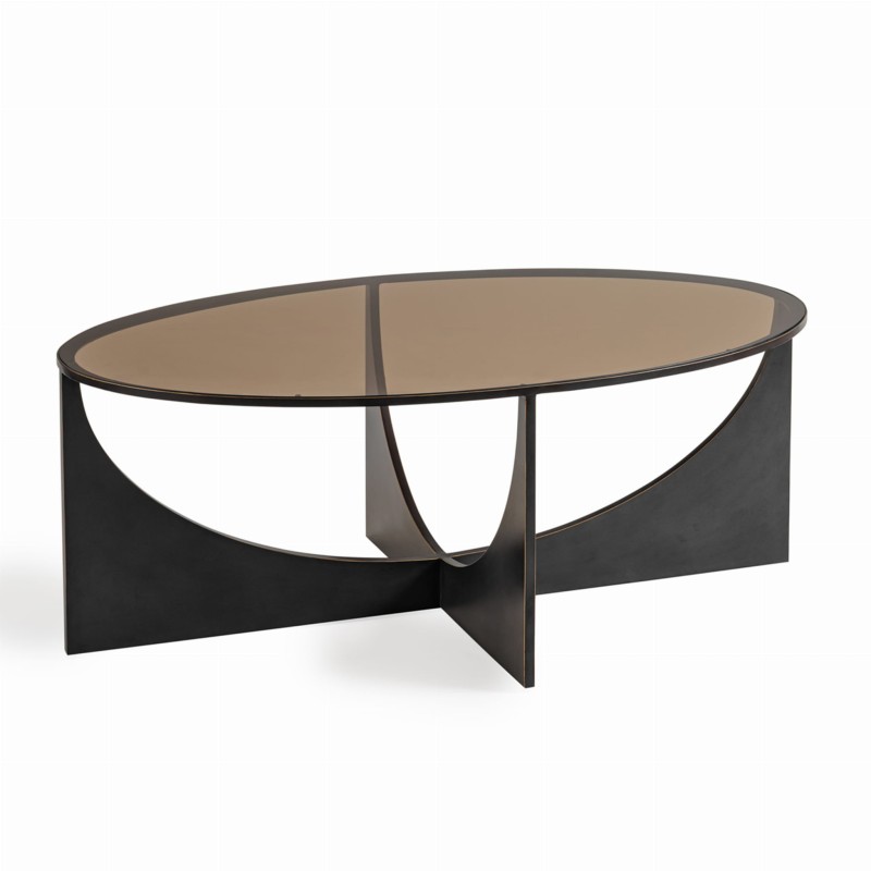 Linton oval glass coffee table with a metal base and refined glass top. Elegant 110 × 65 cm design, perfect for modern living rooms.