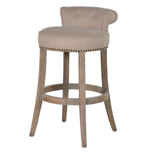 Mayfair bar stool with a low backrest, linen upholstery and wooden legs, ideal for kitchen islands and bar counters.