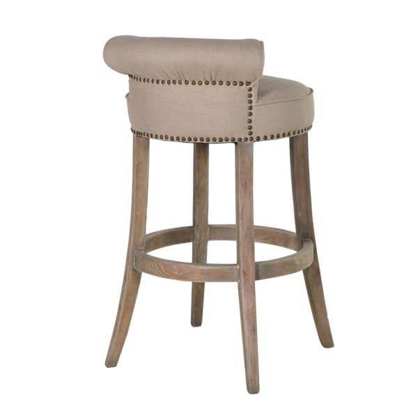 Mayfair bar stool with a low backrest, linen upholstery and wooden legs, ideal for kitchen islands and bar counters.