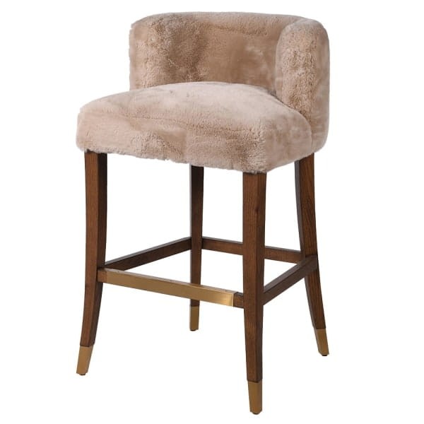 Lyall bar stool with faux shearling upholstery and an oak base. A stylish and comfortable bar stool for kitchen islands and modern interiors.