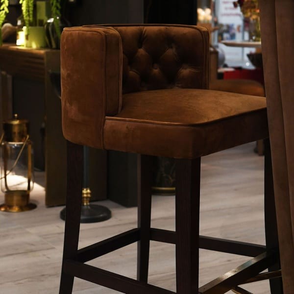 Belgrave mustard bar stool with an oak frame and polyester upholstery. A stylish bar stool designed for the living room or kitchen space.