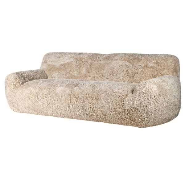 Lyall large curved sofa with warm beige faux sheepskin upholstery
