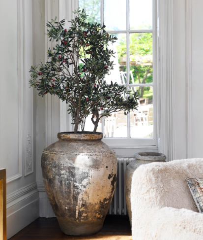 Lifelike artificial olive tree with green leaves
