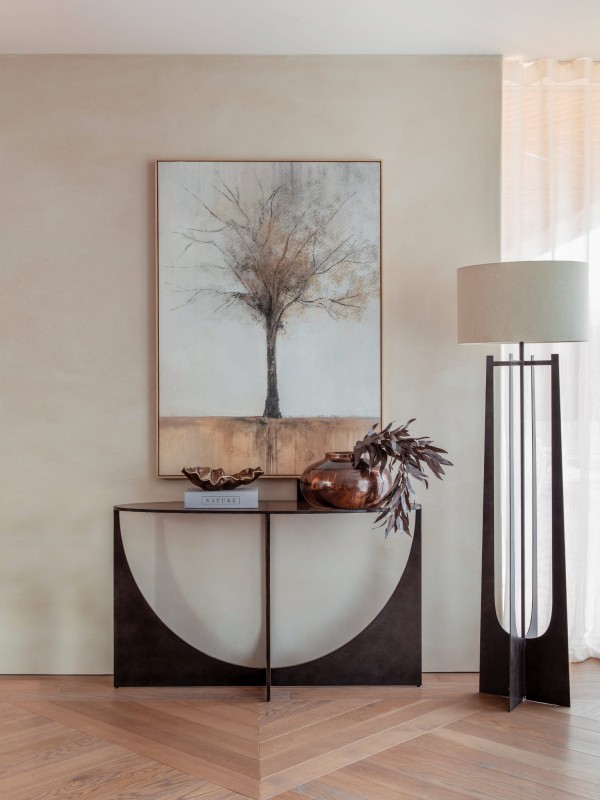 Linton oval glass console table with a metal base and elegant glass top. Slim 130 × 40 cm design, perfect for modern interiors.