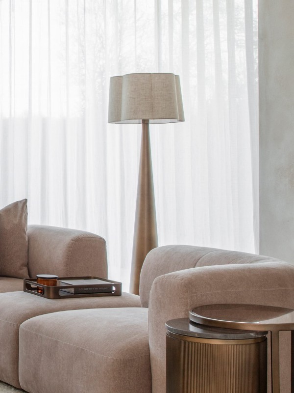 Belgrave standing lamp beside a sofa in an elegant living room