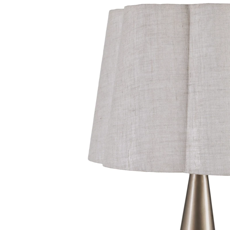 Decorative gold bedside lamp with natural linen shade